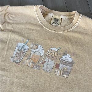 Vintage Washed Tan T-Shirt with Fall Drink Graphics from Pink Lily